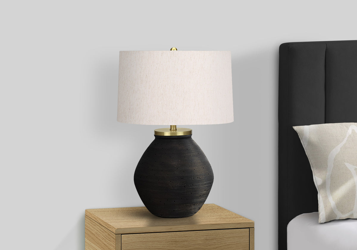 Black table lamp — side view