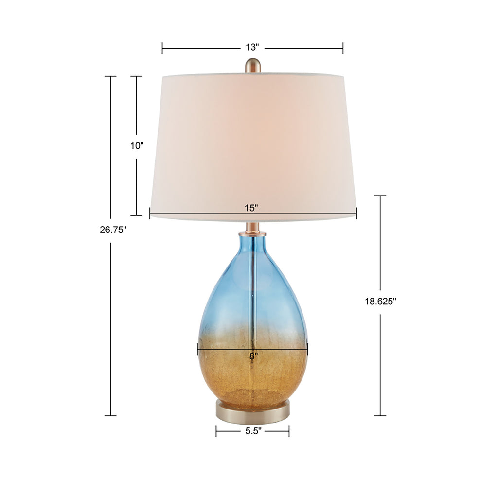 Pair of ombre glass table lamps in a bedroom setting