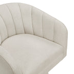 Beige boucle swivel chair in a living room setting