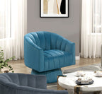 Teal barrel accent chair — in-use view