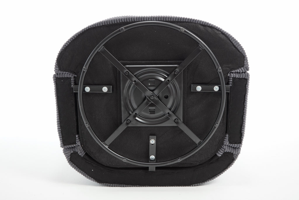 Corduroy barrel chair detail showing the seat cushion