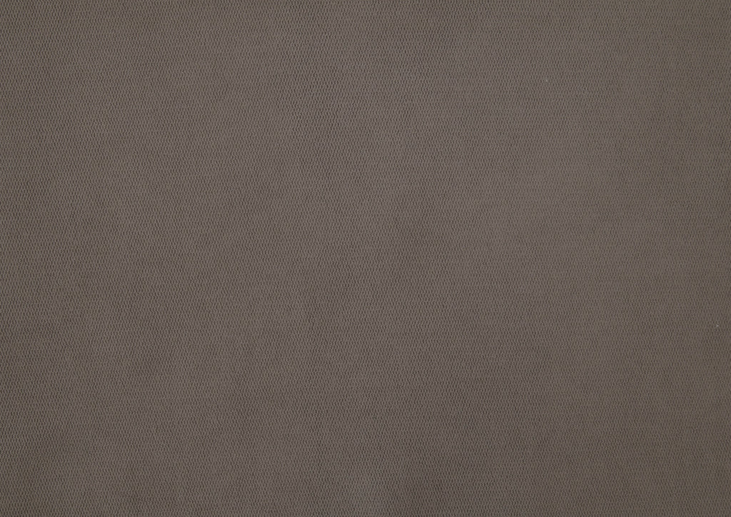taupe barrel accent chair — in-use view