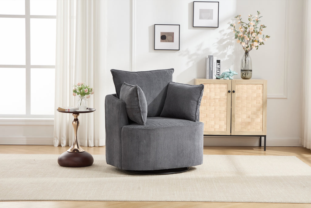 Grey corduroy swivel barrel chair in a bright living room