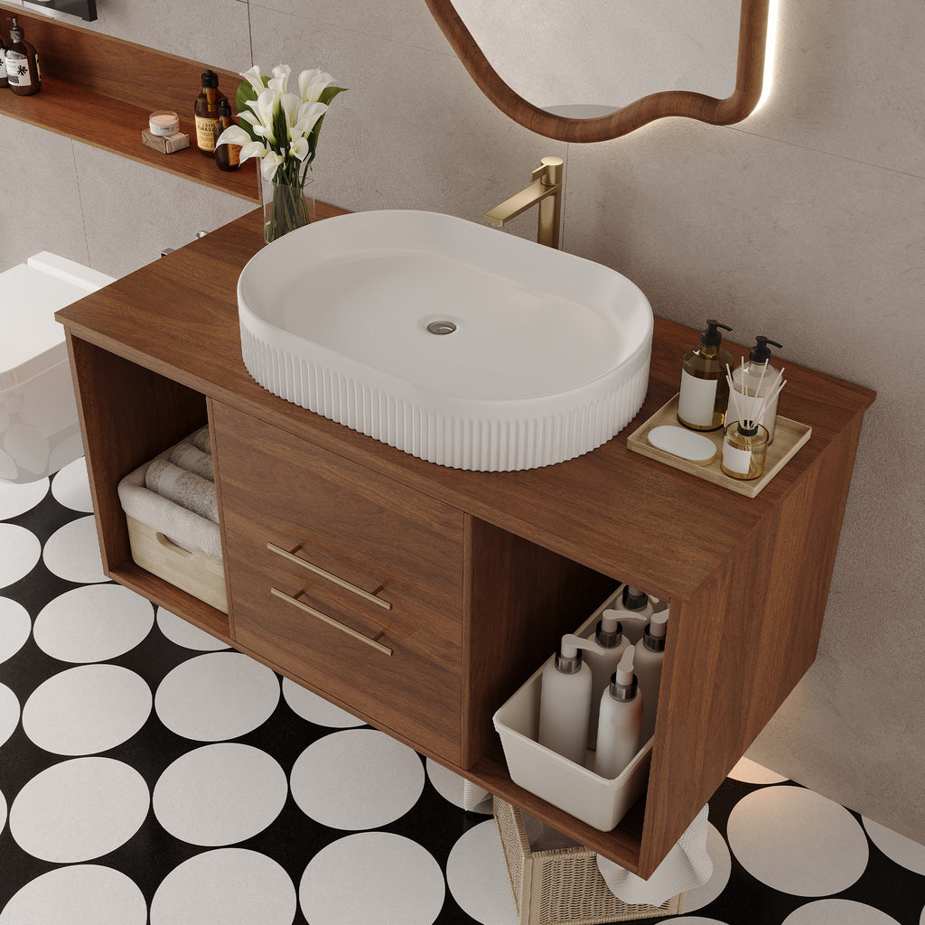 Walnut bathroom vanity with round mirror and faucet