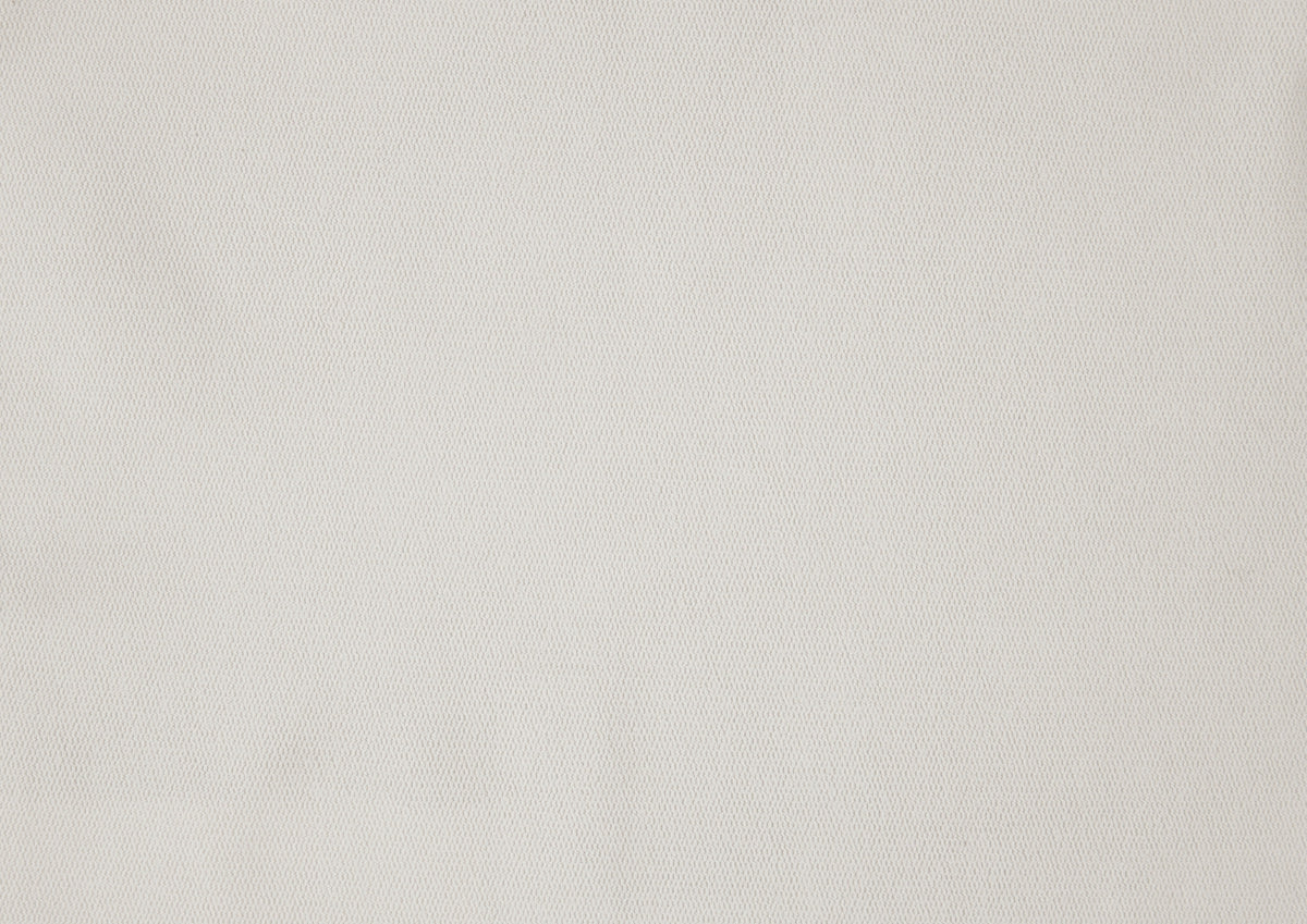 Beige barrel accent chair — in-use view