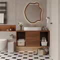 Walnut floating bathroom vanity with oval ceramic sink in a modern bathroom
