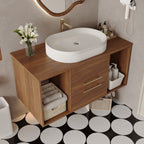 Oval ceramic sink on walnut floating vanity, front view